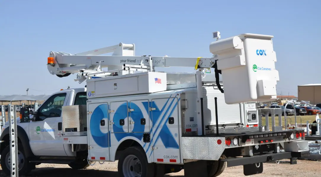 A utility truck with the number 6 0 on it.